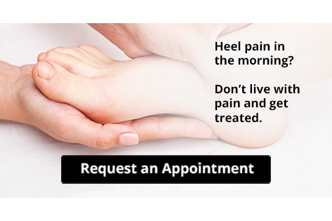 Hands gently holding a foot for heel pain treatment